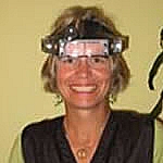 lice specialist wearing goggles